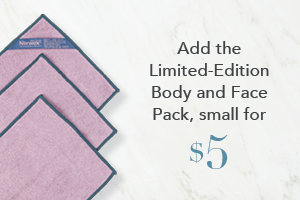 Your order qualifies you to buy the Body and Face Pack, small, lavender with denim trim for $5!